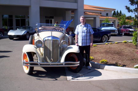 Me next to 30's Chrysler 6 Roadster
