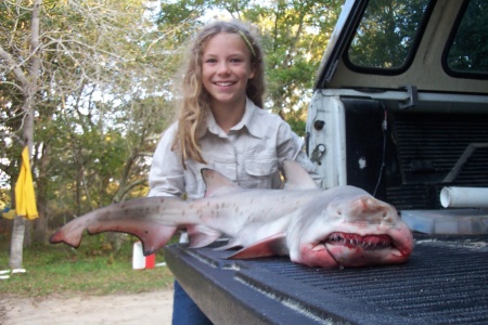 Mia with her beach caught Tiger shark