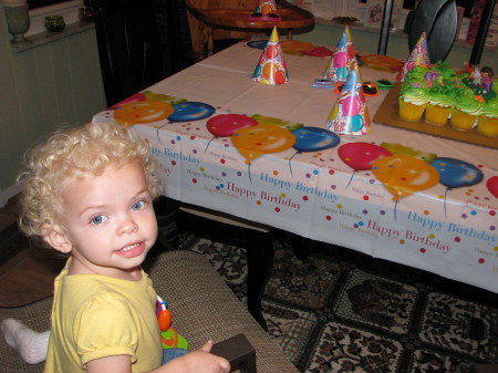 Checking out her cake