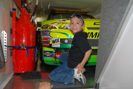 Aiden in Jeff Gorden's truck with his race car