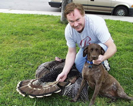 A wild turkey, a dog and a moron