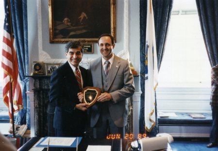 Gov Dukakis presenting me with "Presidential A