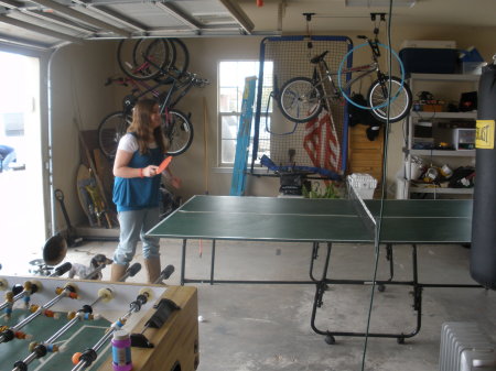 kirstin and evan playing ping-pong.