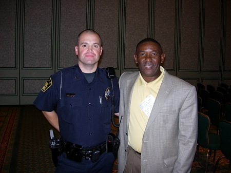 Officer Jason with Chief Rodney Monroe