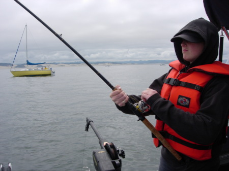 Daughter Kyna pulling in a chinook