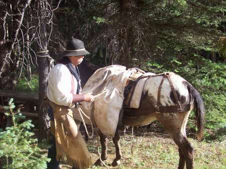 Gary packing the mule for a dinner ride