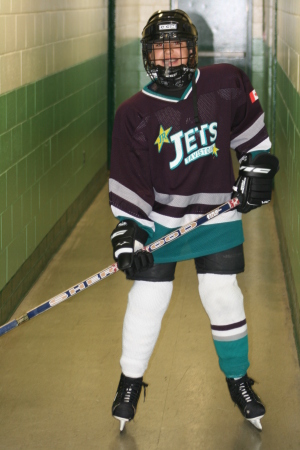 My daughter in her hockey gear