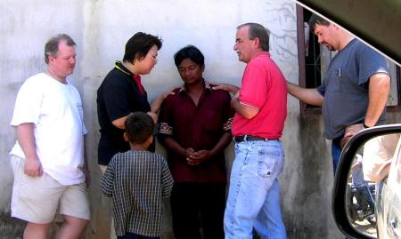 praying with burmese man