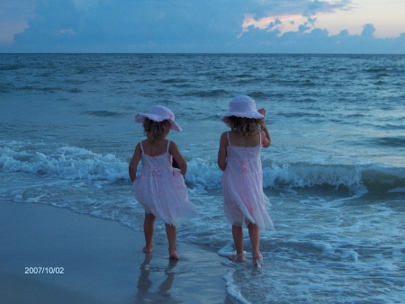 Neices walking on the beach after a Tea Party