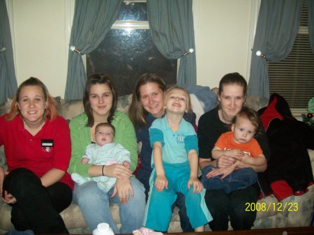 My sisters, me and their kiddos