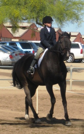 Makenzie riding Chase at Cactus Classic