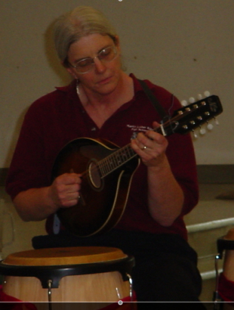 Sharon playing mandolin