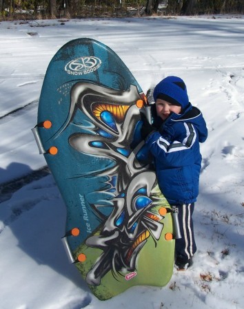 Austin and his snowboard.