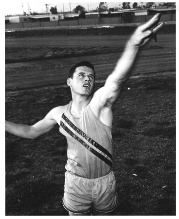 Hadley throwing the Shot Put in High School