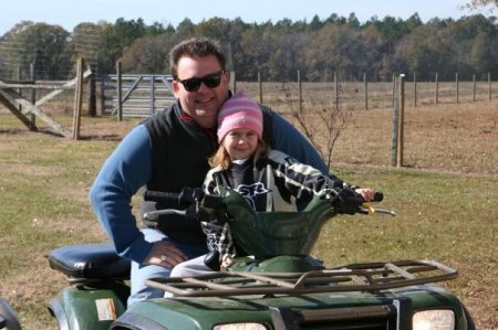 Meghan and Daddy Riding the Four Wheelers