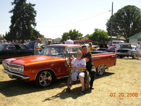 My wife & I, with our first trophy for our car