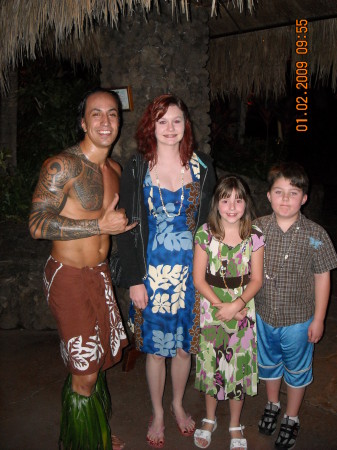 Luau Fire Dancer and my kids