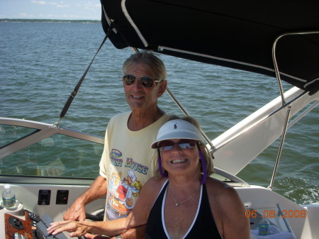 My Husband Bruce and I on our Boat