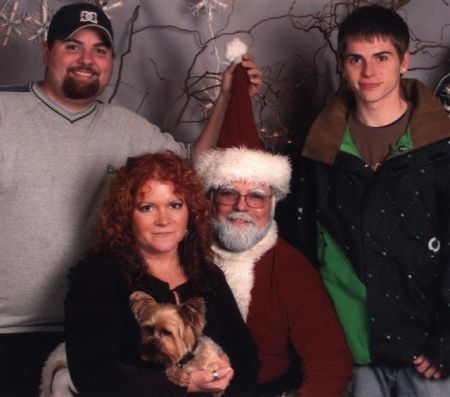 Krista and our two boys with "Santa"