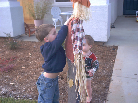 putting up the scarecrow