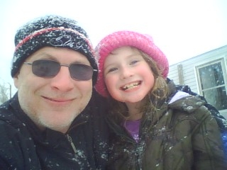 dad and maddie in snow