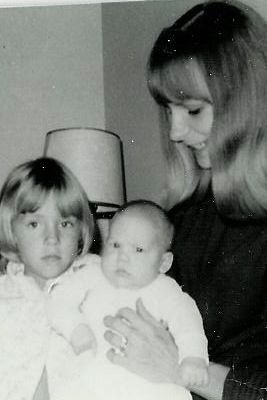 old photo of my mom, my sister and me.