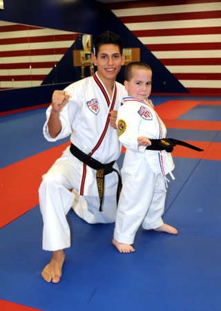 1st Degree Black Belt (4 yrs old)!