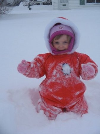 Elizabeth plays in the snow