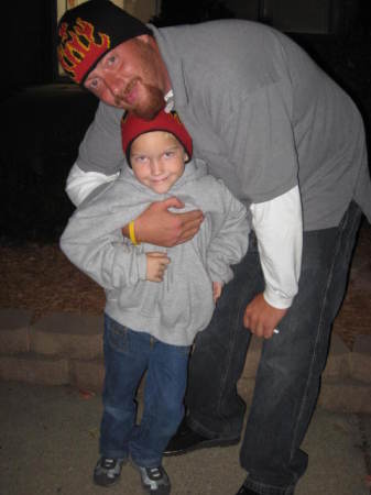 Uncle Jason and Andrew at the hockey game