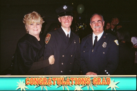 Proud mama/dad at graduation of Fire Academy