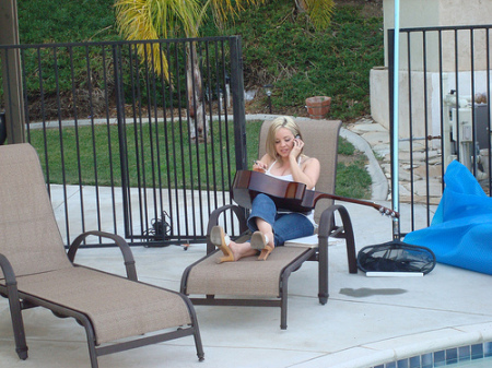 Out at our pool with one of many guitars