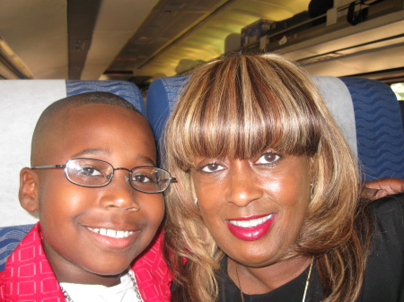 me and my son Jarvis on the train to Georgia