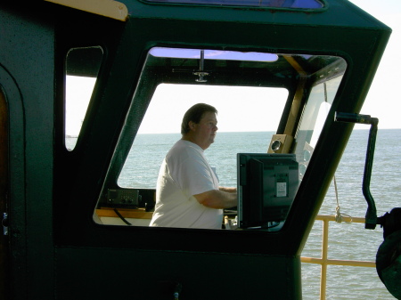 At the stern controls