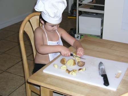 Chef Chimp preps potatos 2008