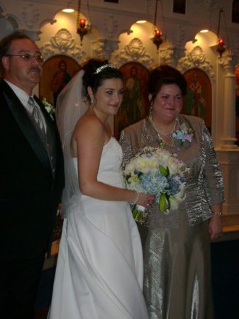 the bride and her parents close up