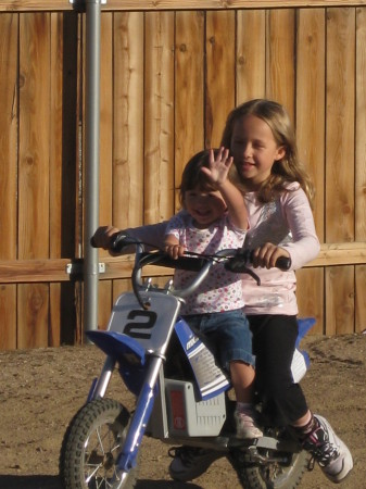 Kaden with Cousin Paisley riding