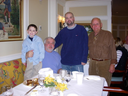Four generations having breakfast