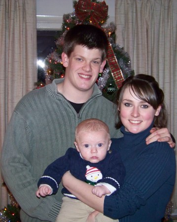 My oldest daughter with her boyfriend and son.