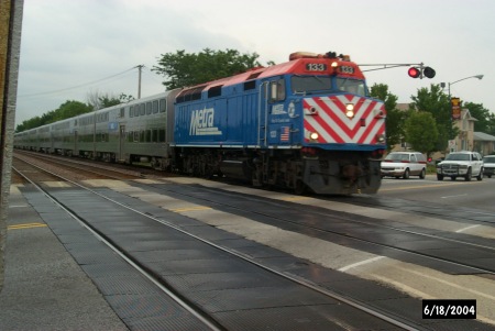 Harlem Ave. and street level train tracks.