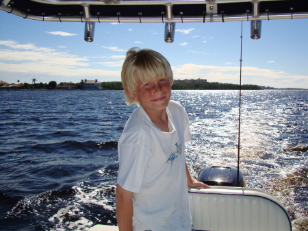 A.J. Driving the boat