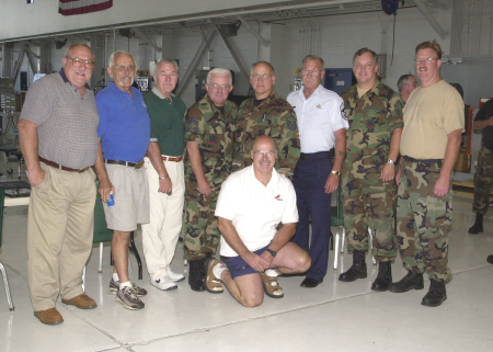 Jerry at his retirement, with friends, 2002.