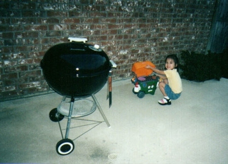 Breanna grilling like her dad.