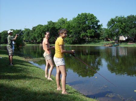 Amanda and Emily fishing in the neighborhood