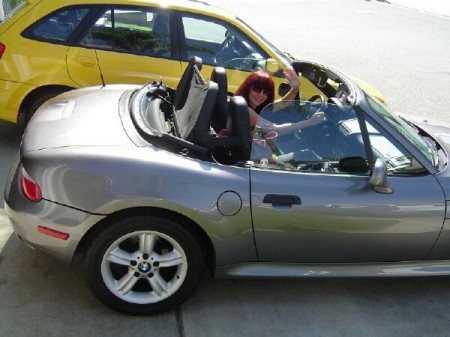 Driving my sports car with the top down!