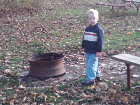 Jeremiah helping Papa build a fire