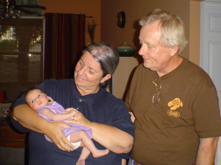 Denny and I with our first grandchild, Olivia