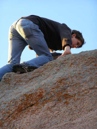 Quinn climbing at Enchanted Rock