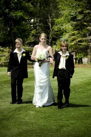 my sons Jacob & Nolen walking their sister dow