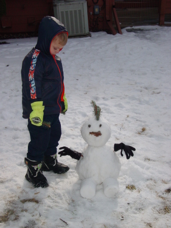 Logan and his 1st snowman