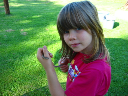 Our daughter with her baby snake!